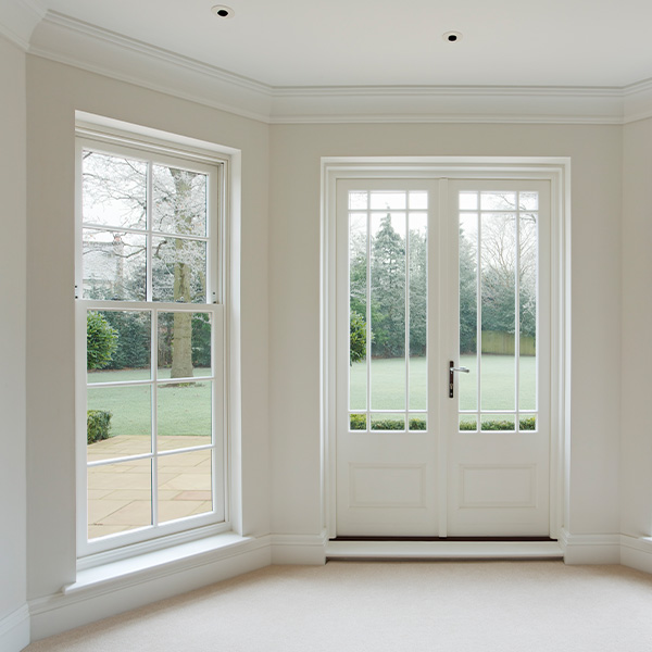 White bay windows and French doors